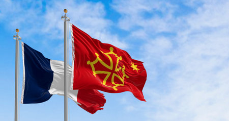 The flags of Occitania and France, representing the rich culture, language (Langue d'oc), and tourism of the southern French region.の写真素材