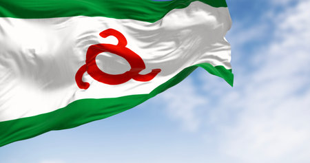 Ingushetia flag waving in the wind on a clear day. Republic and federal subject of Russia nestled in the North Caucasus region. 3D illustration render. Rippling fabric.の写真素材