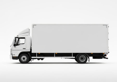 A clean, white box truck is shown in profile against a stark white background, ready for delivery or transport.の素材