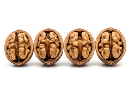 Walnuts isolated on white background. Top view. Flat lay.の素材