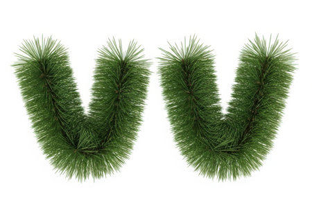 Vibrant green artificial pine garland, meticulously arranged to evoke holiday cheer. Ideal for festive decorations, seasonal projects, and winter designs.の素材