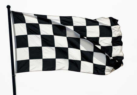 Checkered flag waving in the wind isolated on a white backgroundの素材