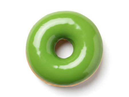 Green glazed donut isolated on white background. Top view.の素材