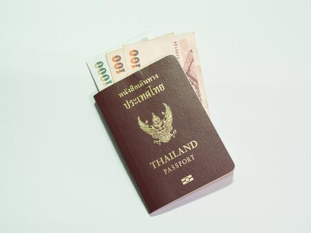 Thai passport with bank noteの写真素材