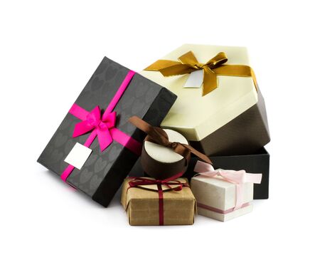 Gift boxes decorated with bows and ribbons isolated on white backgroundの写真素材