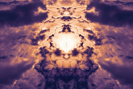 Duplicated sky with ghostly clouds opposite the sunの写真素材