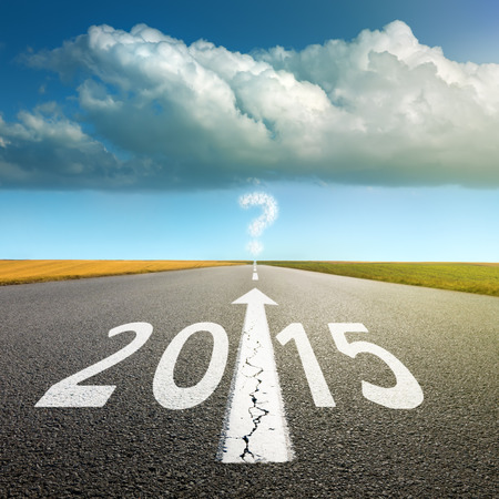 Driving on an empty asphalt road  forward to upcoming new yearの写真素材