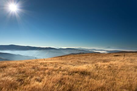 View from the mountain Stara Planina in Serbia at idyllic sunny day above the clouds.の写真素材