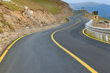 Transalpina zig zag road at day, highest and most dangerous asphalt road in Romania.