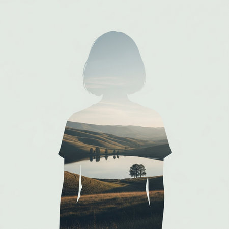 Silhouette of a woman standing on the edge of a fieldの素材