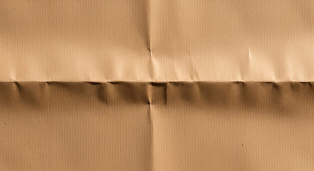 The image shows a detailed view of a folded brown fabric, likely a textile material, with a...