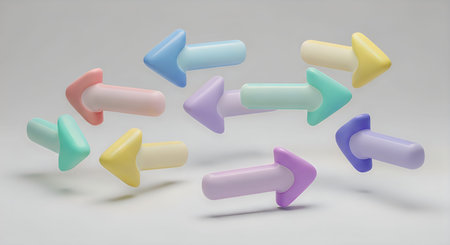 A blurry image of multiple plastic arrows in different colors and orientations floating on a plain...