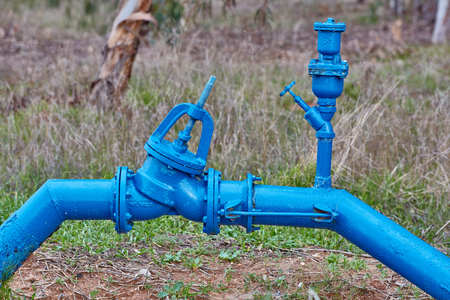 big metal pipe with nature background の写真素材