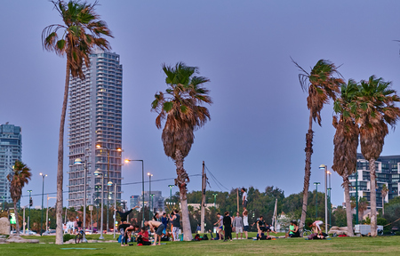 Tel Aviv - 24.05.2017: People doing yoga asanas at the evening in Tel Avivのeditorial素材