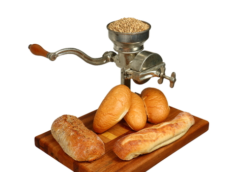 Vintage Grain Mill with Breadの写真素材