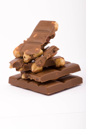 Chocolate blocks with hazelnutsの写真素材