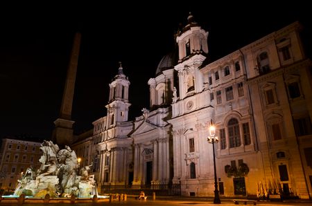 ROME  August 27, 2011  Night version of Navona Square in Rome, with church and fountain illuminated, in Italy.のeditorial素材