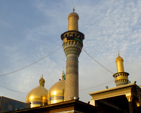 A picture of a Shi'ite shrine Musa al-Kadhim and his grandson Mohammed Jawad, It is a shrine of two gold domes and four minarets and a large courtyard, Located in the city of Kadhimiya in Baghdad.のeditorial素材