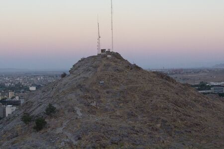 Mashhad Iran   August 30 2014: Aerial view of the Holy City of Mashhad and the shrine of Imam Reza Show some high buildings And some mountains and high plateaus and terrain to the city.のeditorial素材