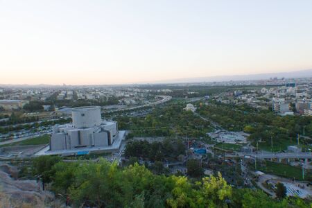 Mashhad Iran   August 30 2014: Aerial view of the Holy City of Mashhad and the shrine of Imam Reza Show some high buildings And some mountains and high plateaus and terrain to the city.のeditorial素材