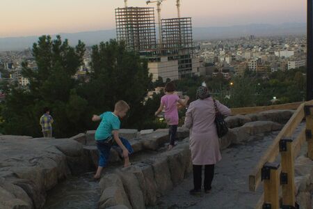 Mashhad Iran   August 30 2014: Aerial view of the Holy City of Mashhad and the shrine of Imam Reza Show some high buildings And some mountains and high plateaus and terrain to the city.のeditorial素材
