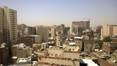 Picture of the city of Mecca Which show high buildings and residential complexes.のeditorial素材