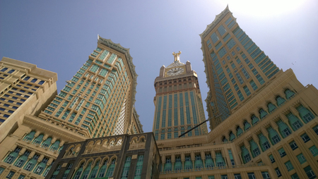 Picture of Makkah Clock Tower, It is a tower containing the hotels overlooking the Kaaba and at its peak clock and panel containing Koranic verses written on every minute change.のeditorial素材