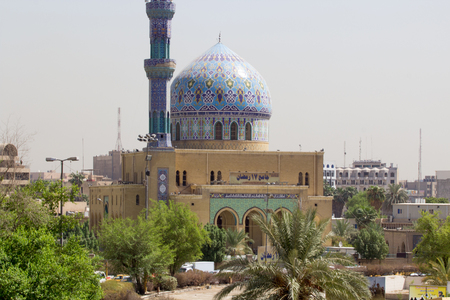 Picture of a mosque 17 Ramadan in Baghdad in Iraq, its contains a decorated dome and minaret.のeditorial素材