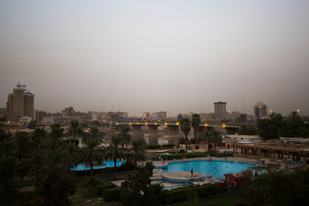 Aerial photo of the city of Baghdad, and shows where residential complexes and the Tigris River and bridges. The city of Baghdad, capital of Iraq.のeditorial素材