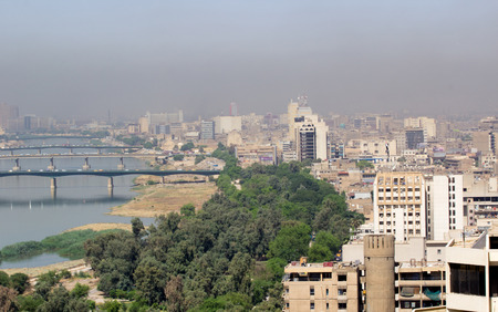 Baghdad, Iraq â September 21, 2015: Aerial photo of the city of Baghdad, and shows residential complexes and the Tigris River and bridges. The city of Baghdad, capital of Iraq.のeditorial素材