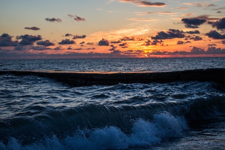 beautiful sunset in the sea, the view from the shoreの写真素材