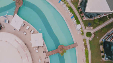 Top view of the territory of an expensive hotel. Spa resort Swimming pool. Aerial drone view Luxury...