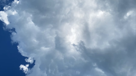Background of lush clouds and blue sky