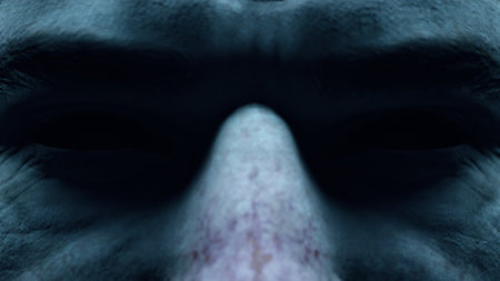 Scary menacing gaze of a man with empty black eyes close-up. Horror concept. Character facial with...