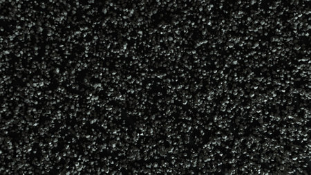 Thousands of falling pieces of stone on a flat black surface. Abstract background. Top View 3d...