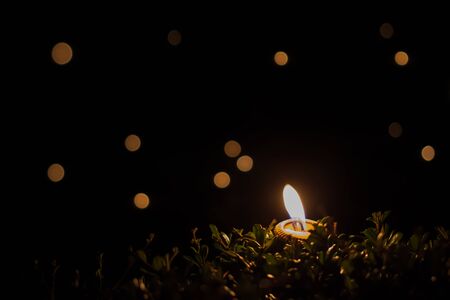 Candle In The Dark With Bokehの写真素材