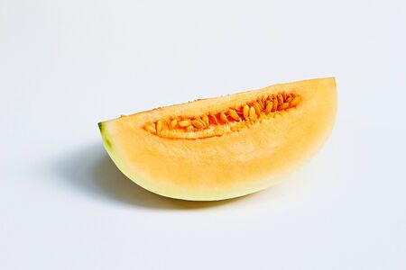 Close up of orange cantaloupe isolated on white background.の写真素材
