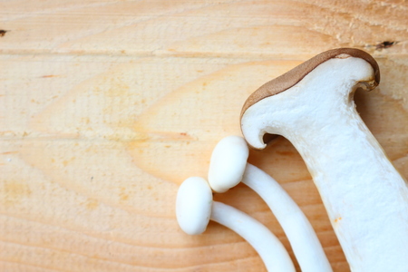 Fresh of organic mushrooms on wooden background.の写真素材