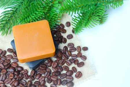 Coffee and chacoal handmade glycerin soap bars on white background with copyspace.の写真素材