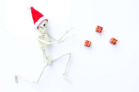 Santa ghost running for his gifts boxes that blowing far away from him.