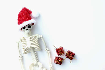 Santa Ghost and red Christmas gift boxes on white background.の写真素材