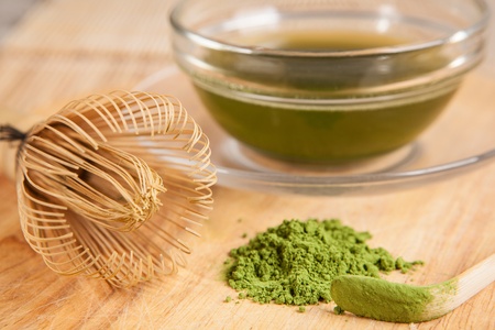 powdered green tea on the wood