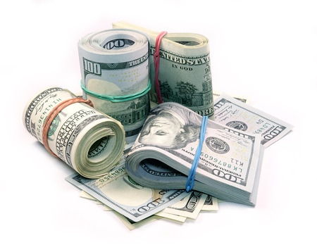 Bundle of Dollar Bills isolated on white backgroundの写真素材