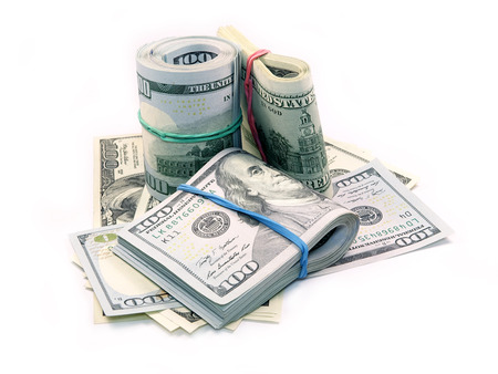 Bundle of Dollar Bills isolated on white backgroundの写真素材