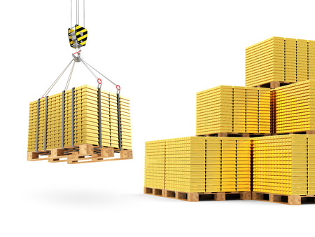 Business, Financial, Bank Gold Reserves Concept. Crane Hook with Stacked Golden Bars on a Wooden Pallets isolated on white backgroundの写真素材