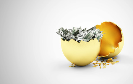 Business Financial Success or Wealth and Riches Concept. Broken Big Golden Egg with Heap of Dollar Bills Inside on gradient backgroundの写真素材