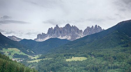 Amazing Italian Alps Dolomites Aerial View with Green Fields and Forest