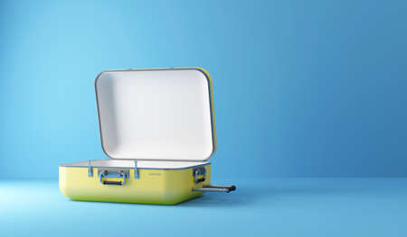 3d rendering of a yellow suitcase on a blue background.の写真素材