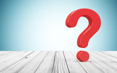 Red question mark on white wooden table over blue background. 3d renderingの写真素材