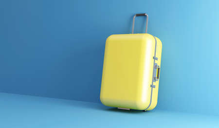 3D rendering of a yellow travel suitcase on a blue background.の写真素材